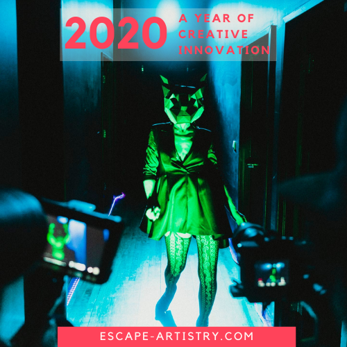 Image Of Woman Walking Down A Dark Hallway With A Stylized Animal Mask On Lit By Green And Blue Lights. Photographers Are Seen Taking Her Picture.